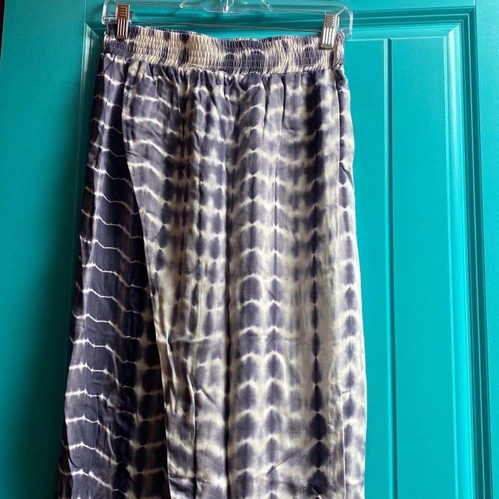 100% cotton. Brand new. Loose, soft, and comfortable long pants.